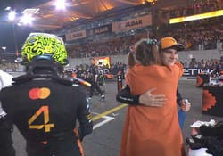 Lando's mom gave Oscar a warm hug after the big win.