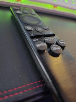 Spilled motor oil on my Samsung TV remote causes buttons to swell.