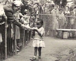 A young black girl trapped in a human zoo in post-war Brussels
