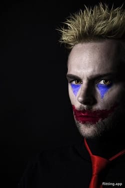 Why does Alastor wear glasses differently depending on the character he's playing?