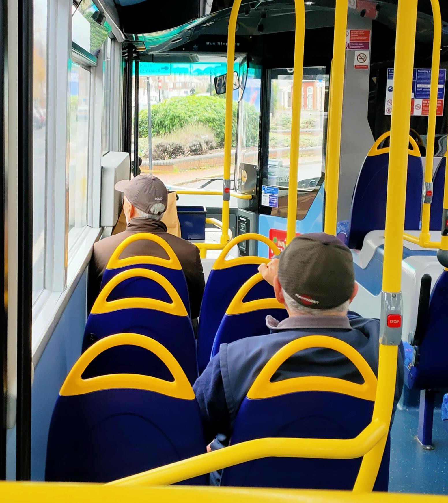 Older folks are rocking baseball caps over flat caps