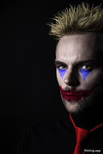 Why does Alastor wear glasses differently depending on the character he's playing?